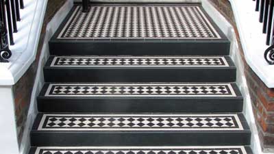 Tiled steps - can be tiled over a thin screed bonded to asphalt.