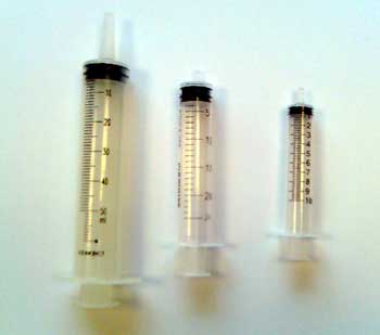 Syringes - for measuring resin liquids or for injecting resins